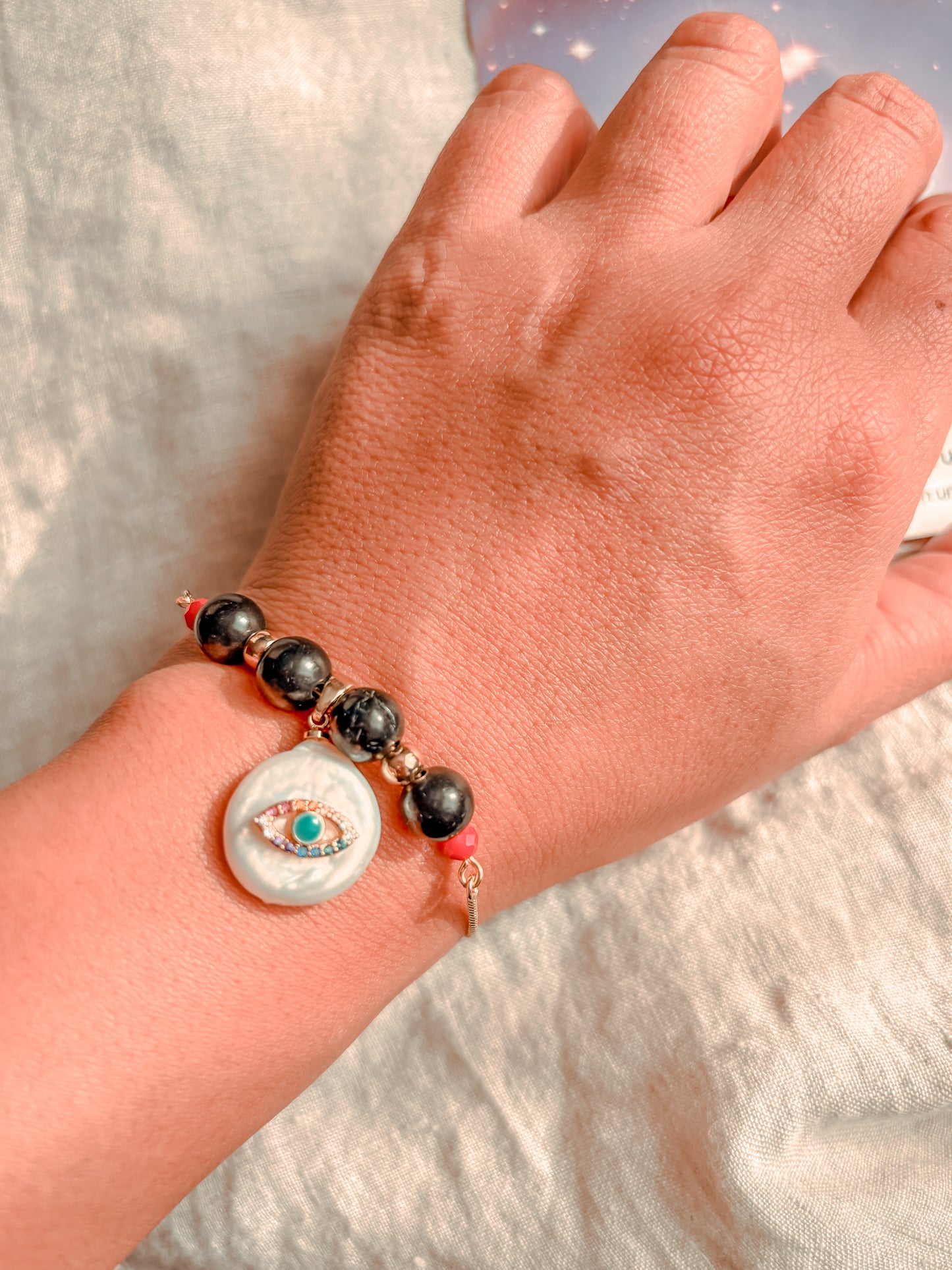 Pulsera Amuleto Ojo Turco Protector: Shunguita y Nácar Natural