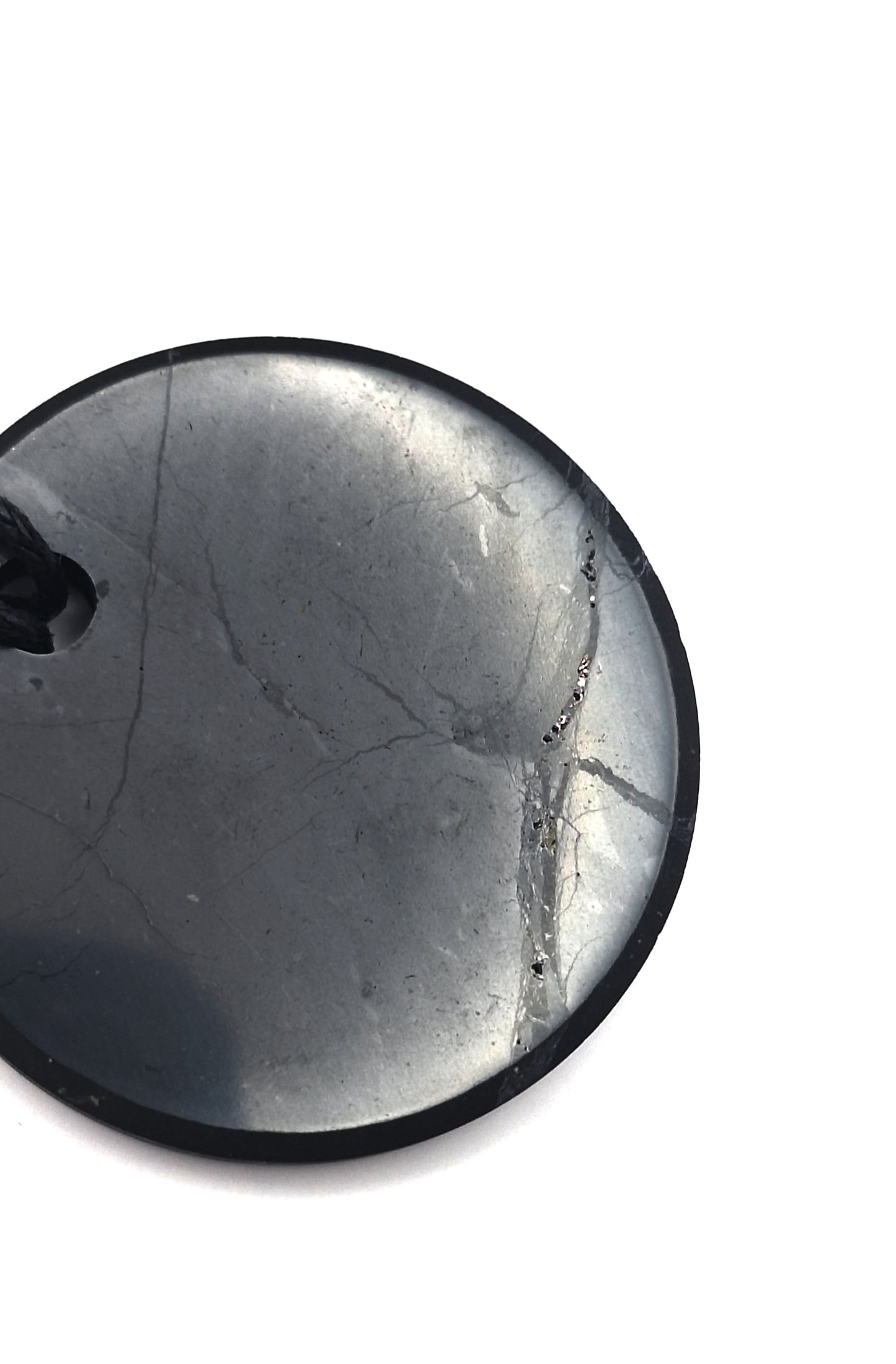 COLGANTE CIRCULAR DE SHUNGUITA (shungite-shungit-shugita) + REGALO trozo shungita Élite